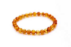 Orange Amber Sphere Bead Bracelet