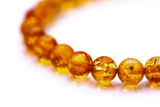 Orange Amber Sphere Bead Bracelet